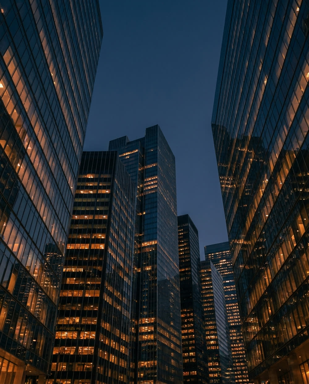 Modern corporate towers at blue hour